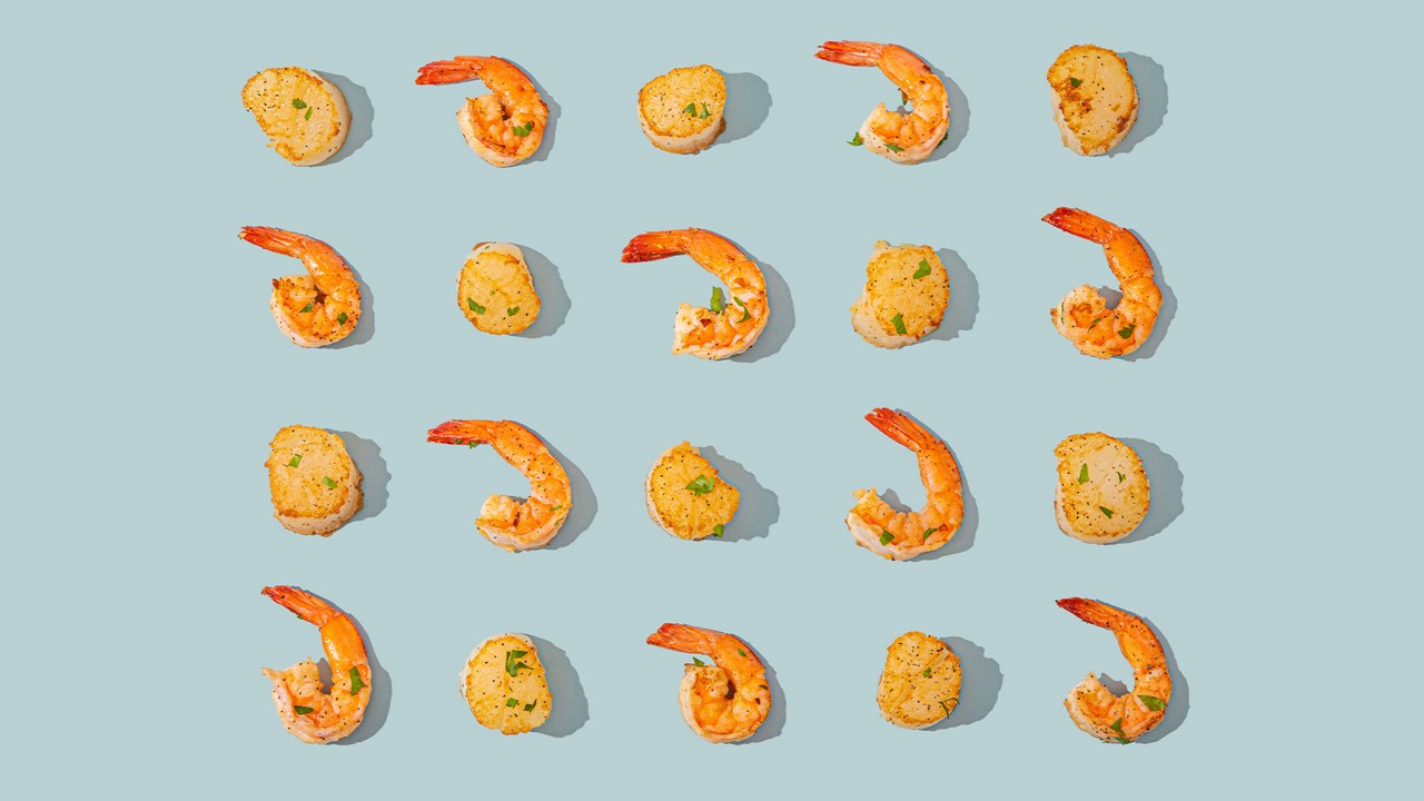 Shellfish lined up in neat rows. Adults can develop shellfish allergy