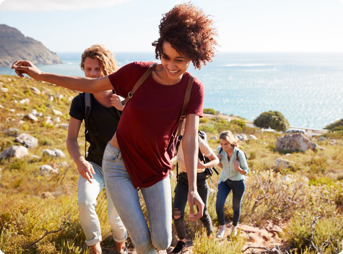 group of friends that have managed their allergy symptoms on outdoor hike