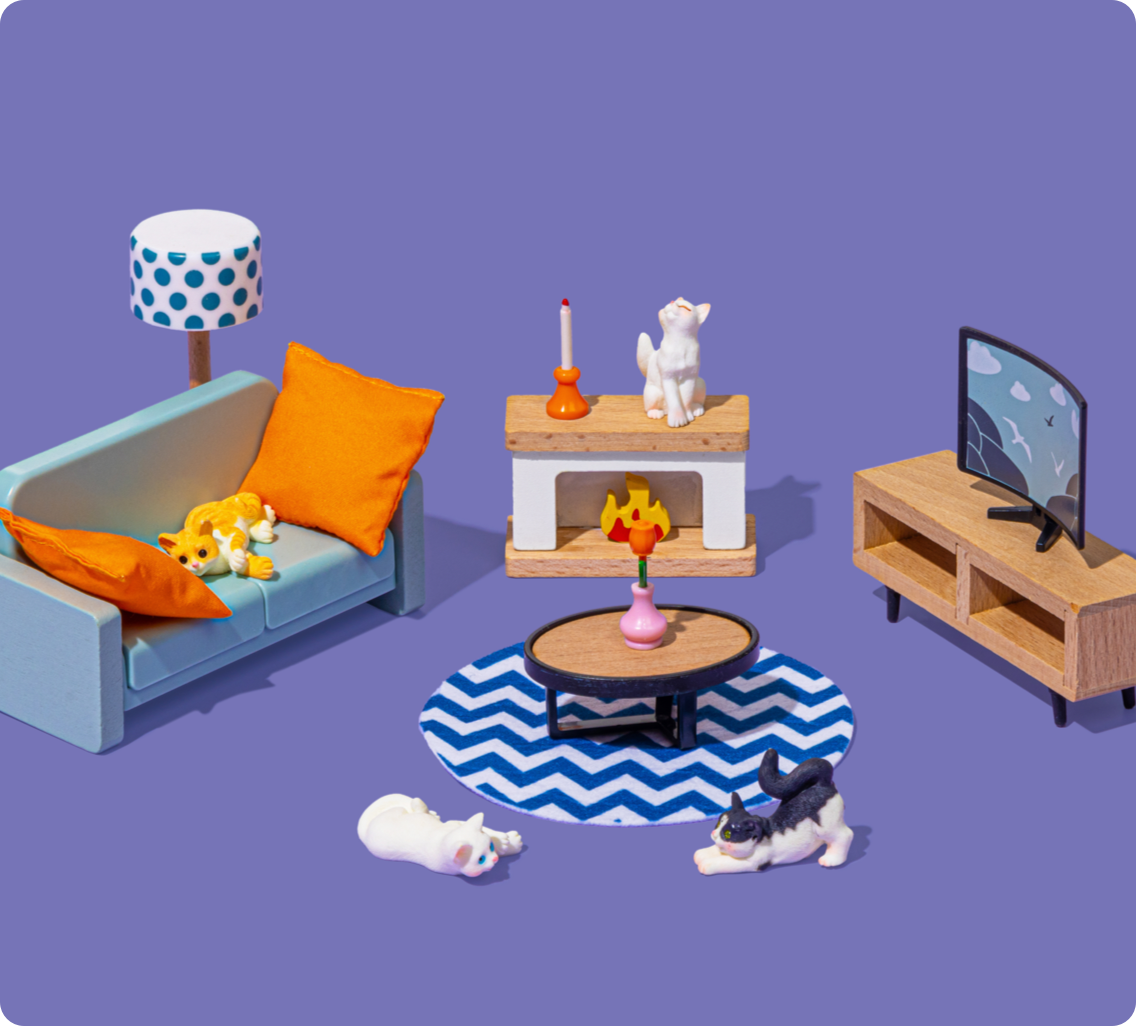 Diorama d'un salon avec des chats 