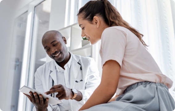 Healthcare provider listens to patient describe their allergy symptoms 