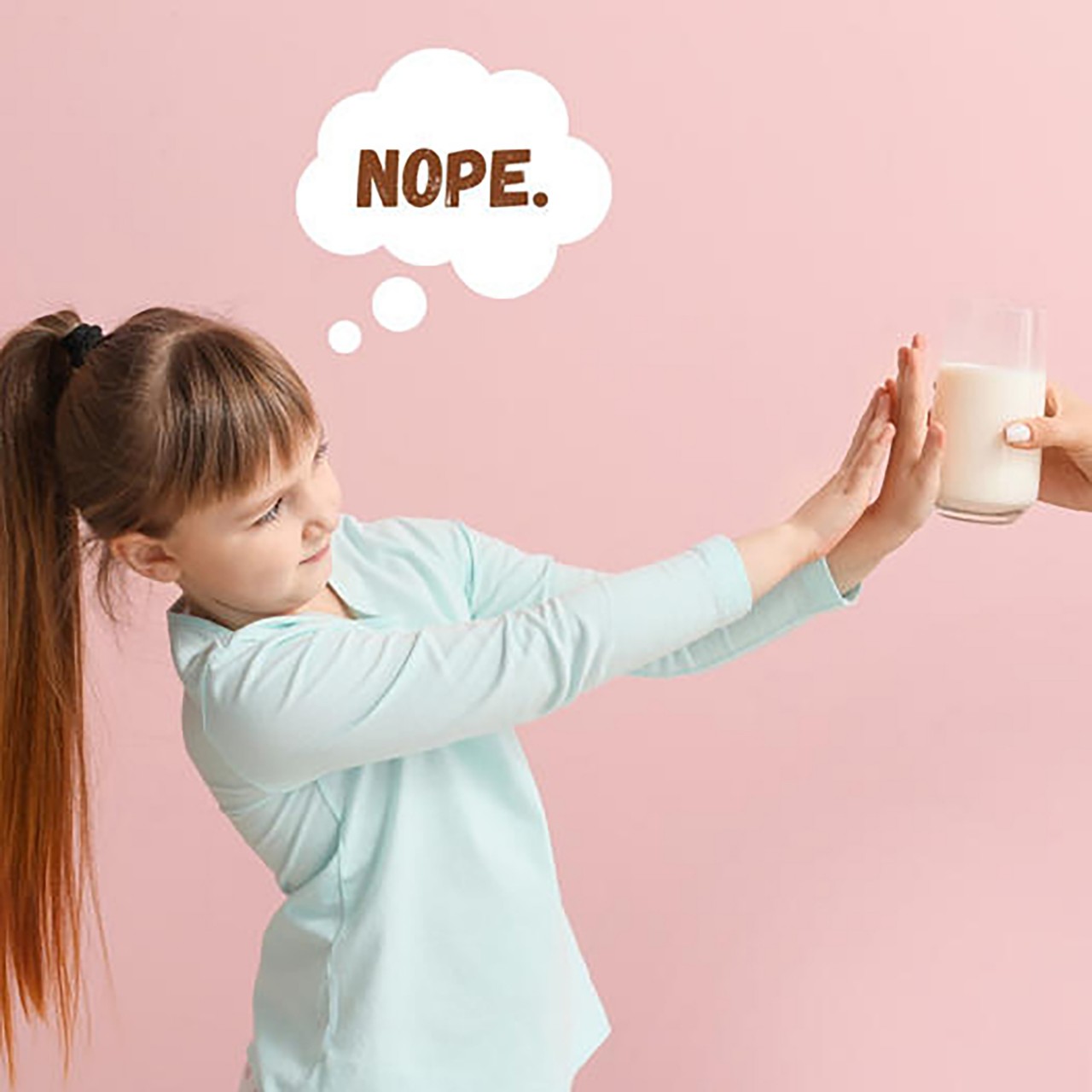 Girl saying nope to milk